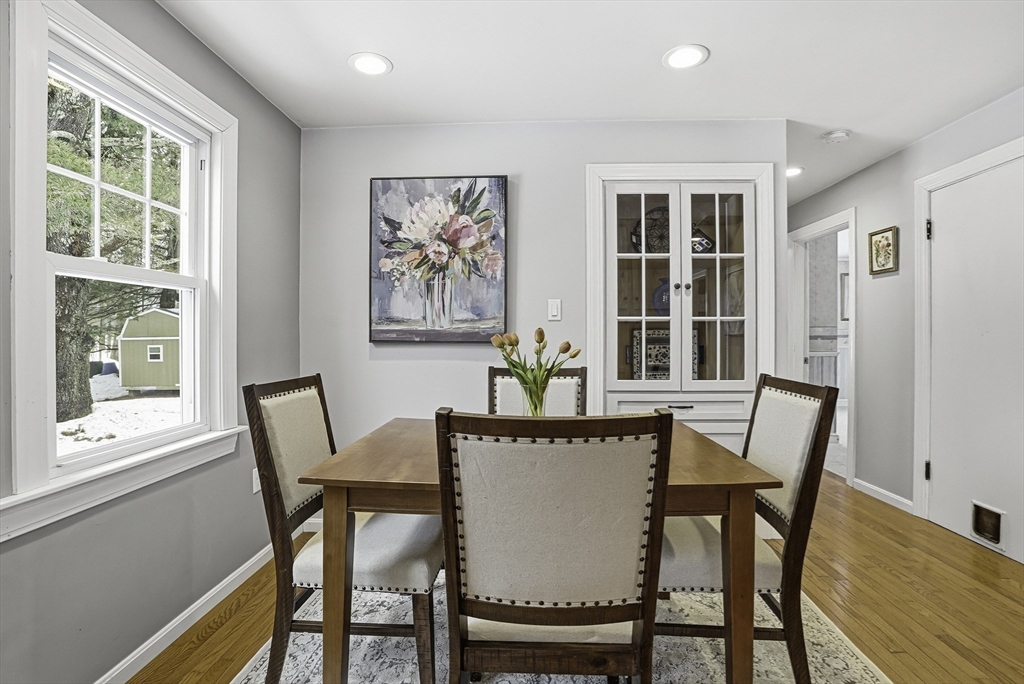 300 West Main Street Hopkinton, MA 01748 - Photo 6 of 26 a view of a dining room with furniture window and wooden floor
