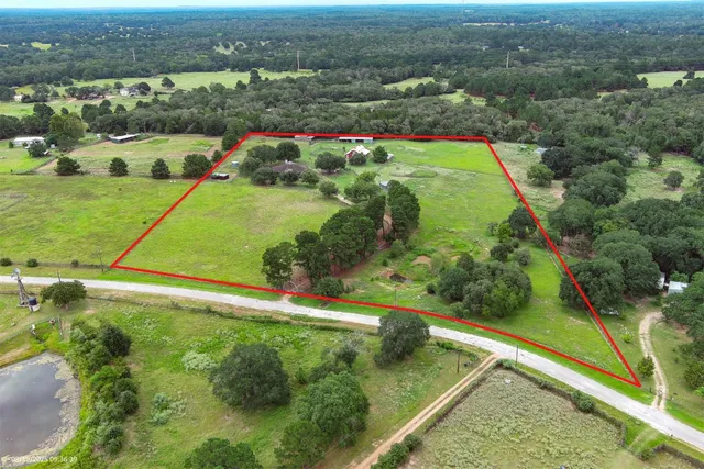 a view of a garden from a balcony