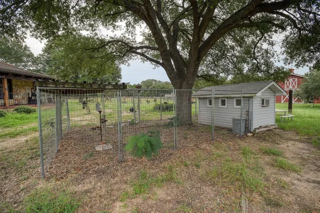 a backyard of a house with lots of green space