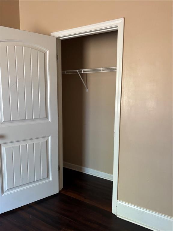 7562 Watson Circle Locust Grove, GA 30248 - Photo 20 of 66 a view of an empty room with wooden floor