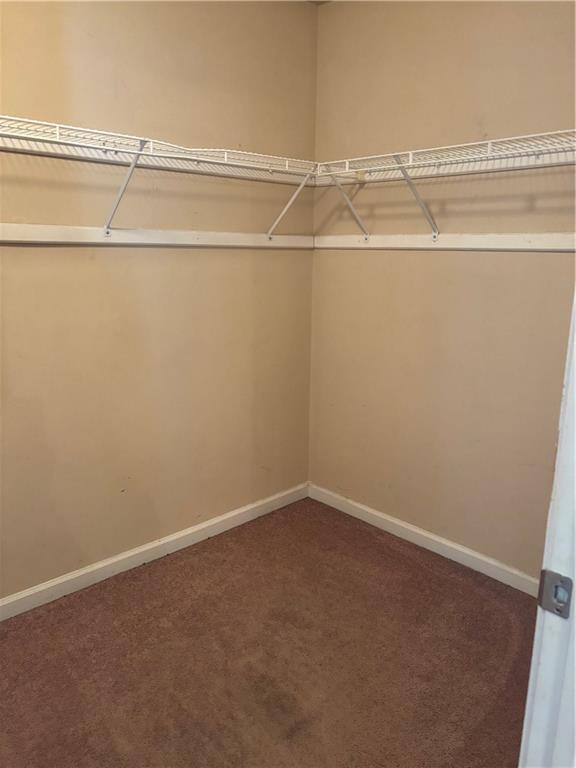 7562 Watson Circle Locust Grove, GA 30248 - Photo 30 of 66 a view of a room with racks on the wall