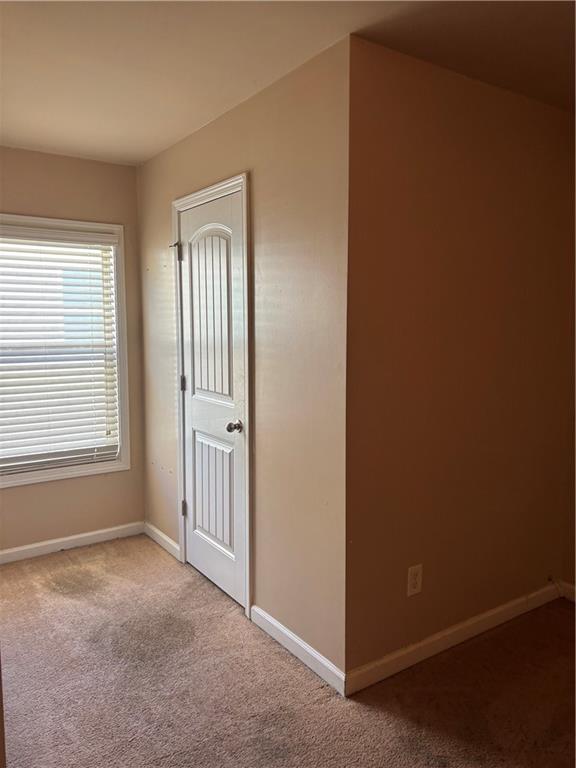 7562 Watson Circle Locust Grove, GA 30248 - Photo 33 of 66 an empty room with windows