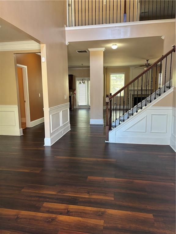 7562 Watson Circle Locust Grove, GA 30248 - Photo 4 of 66 a view of entryway and hall with wooden floor