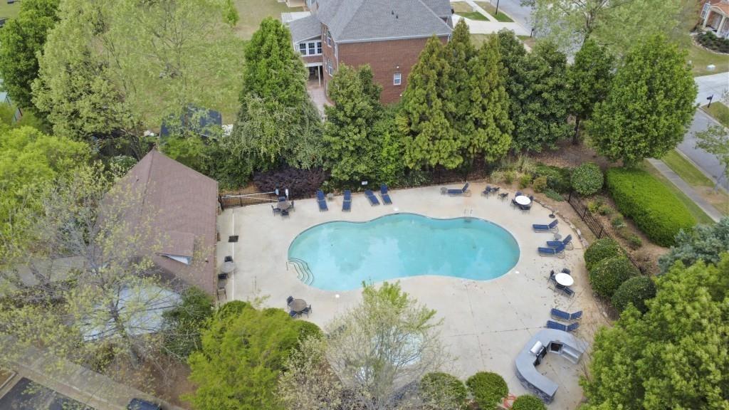 7562 Watson Circle Locust Grove, GA 30248 - Photo 65 of 66 an aerial view of a house with a yard and trees