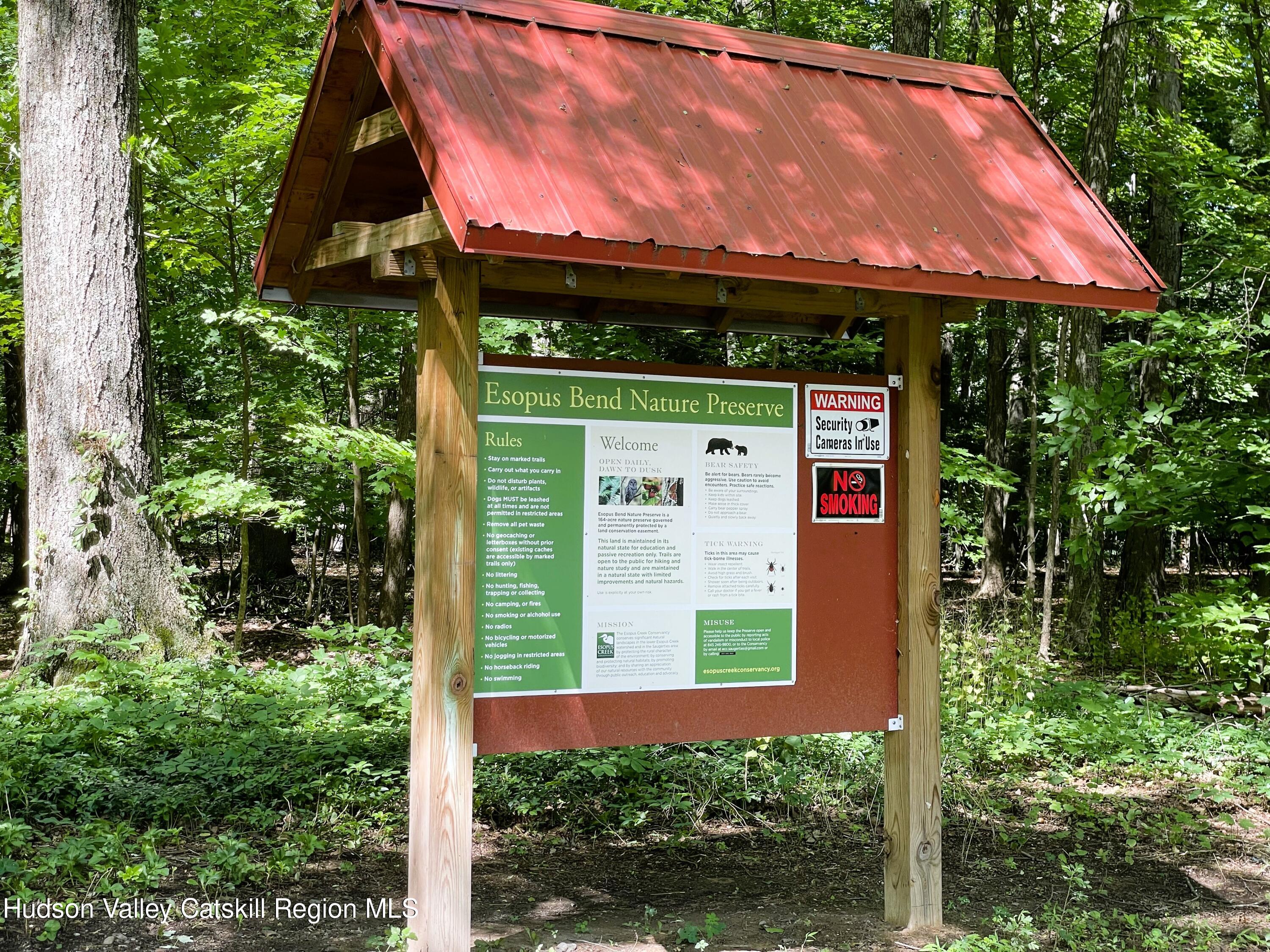 15 Dewitt Drive Saugerties, NY 12477 - Photo 5 of 5 a sign that is sitting on a brick wall