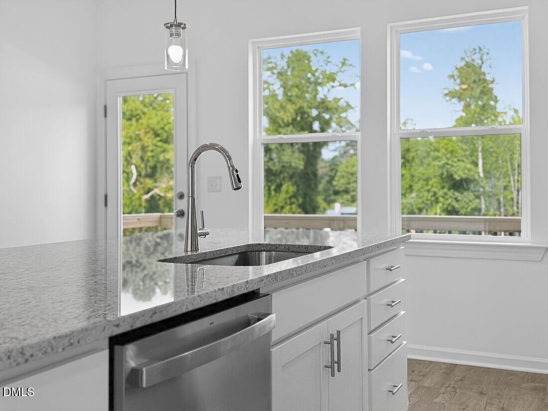 1324 West Garner Road, Unit 101 Garner, NC 27529 - Photo 12 of 29 a sink with a large window