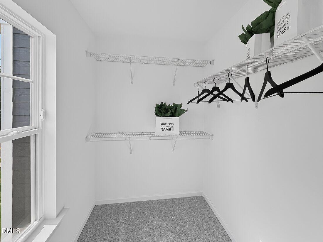 1324 West Garner Road, Unit 101 Garner, NC 27529 - Photo 23 of 29 a view of small space with racks on the wall