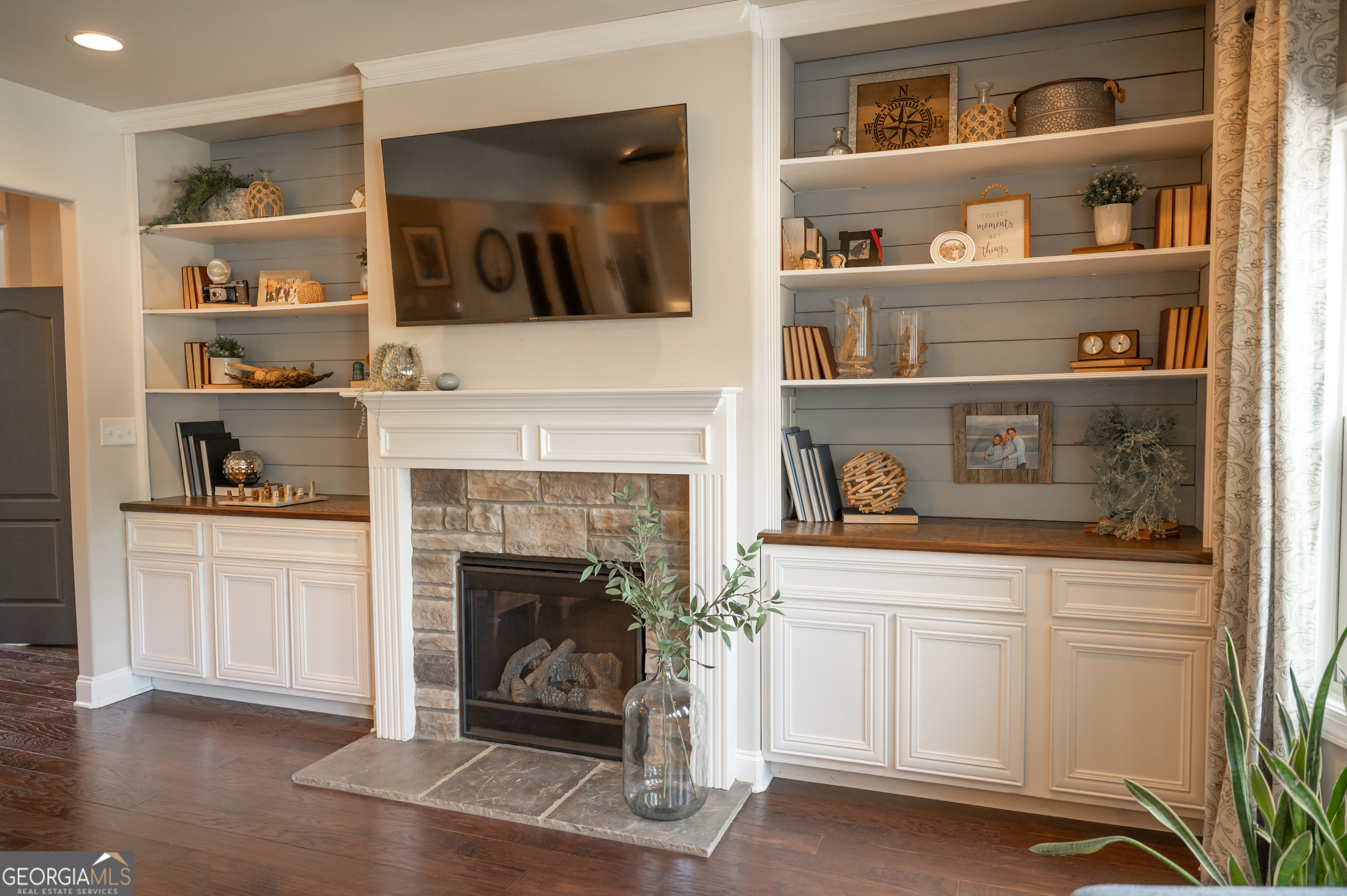 415 EAS Way Fayetteville, GA 30215 - Photo 6 of 70 a living room with furniture and a fireplace