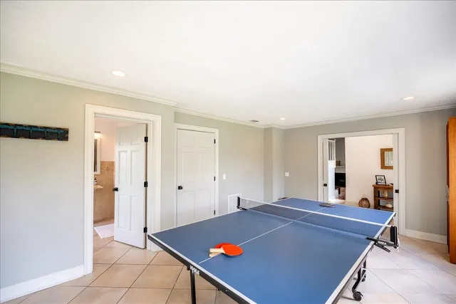 a bathroom with a sink a mirror and a shower