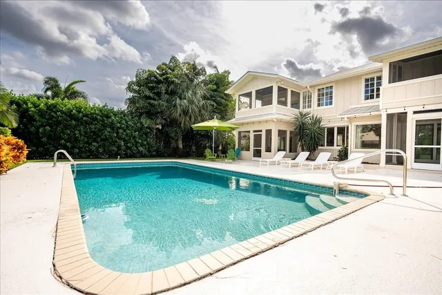 a view of swimming pool from a window