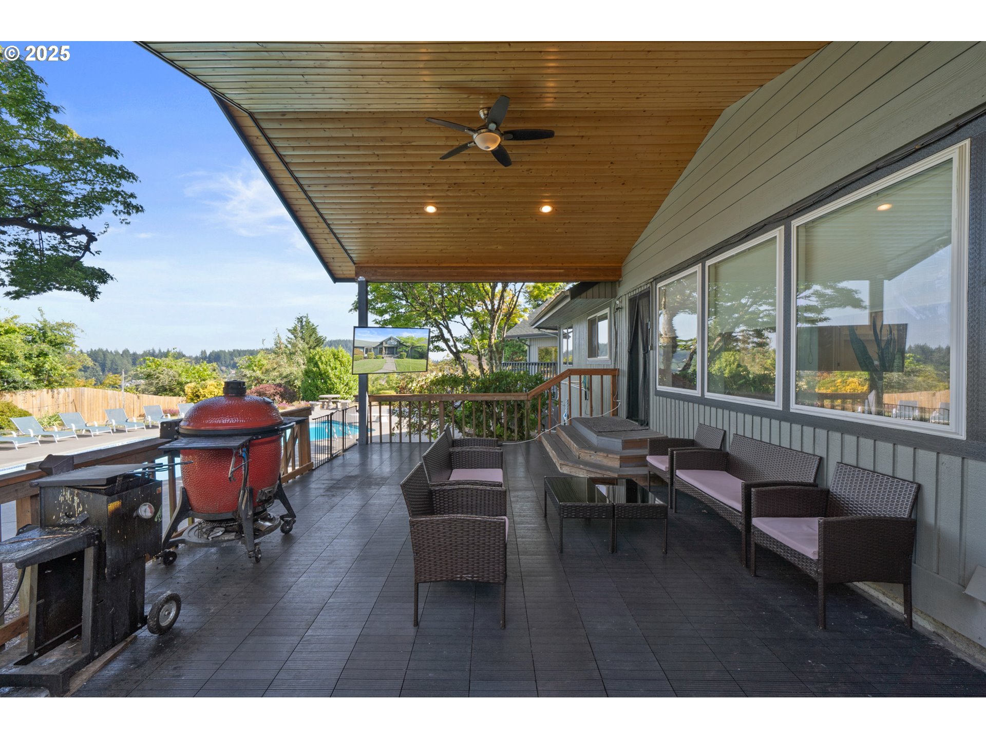 14330 Southeast Donatello Loop Happy Valley, OR 97086 - Photo 34 of 45 a living room with furniture and a large window
