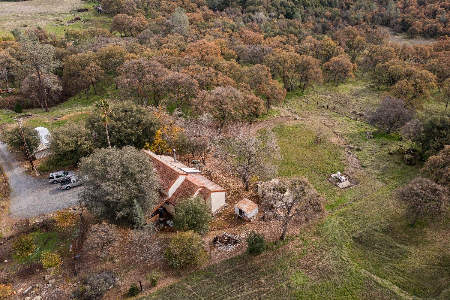 Aerial picture of home.  You can see the pastures to the right and ahead