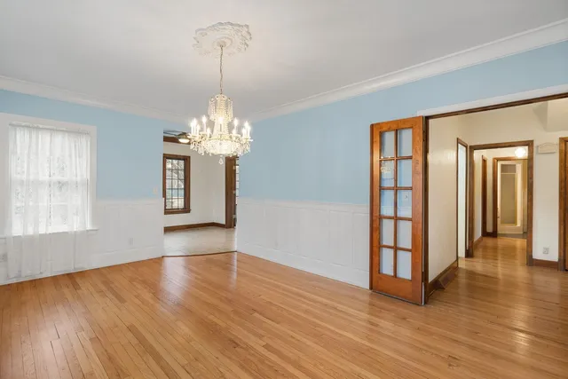 a kitchen with granite countertop a stove sink and cabinets