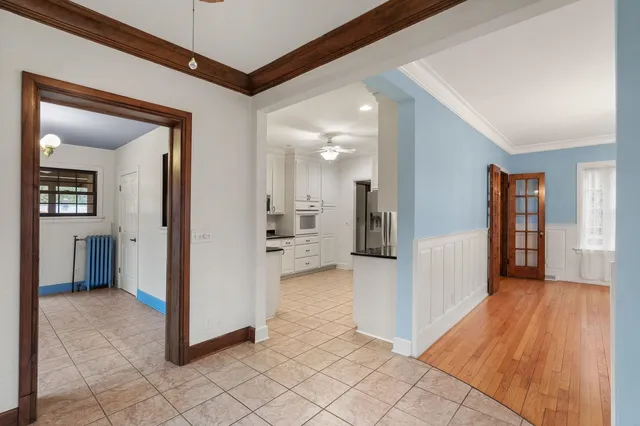 a kitchen with stainless steel appliances granite countertop a refrigerator sink and cabinets