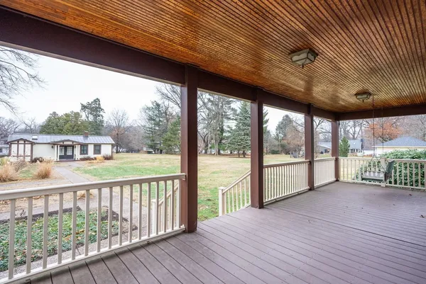 a kitchen with stainless steel appliances granite countertop a refrigerator stove a sink and a microwave