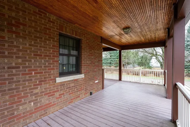 a view of big yard with an outdoor space
