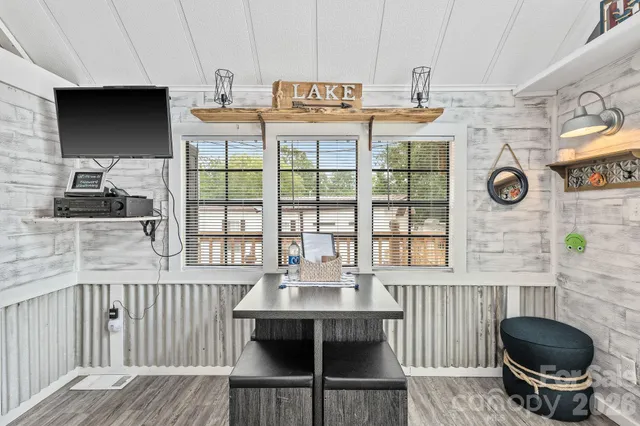 a kitchen with a sink and a stove top oven