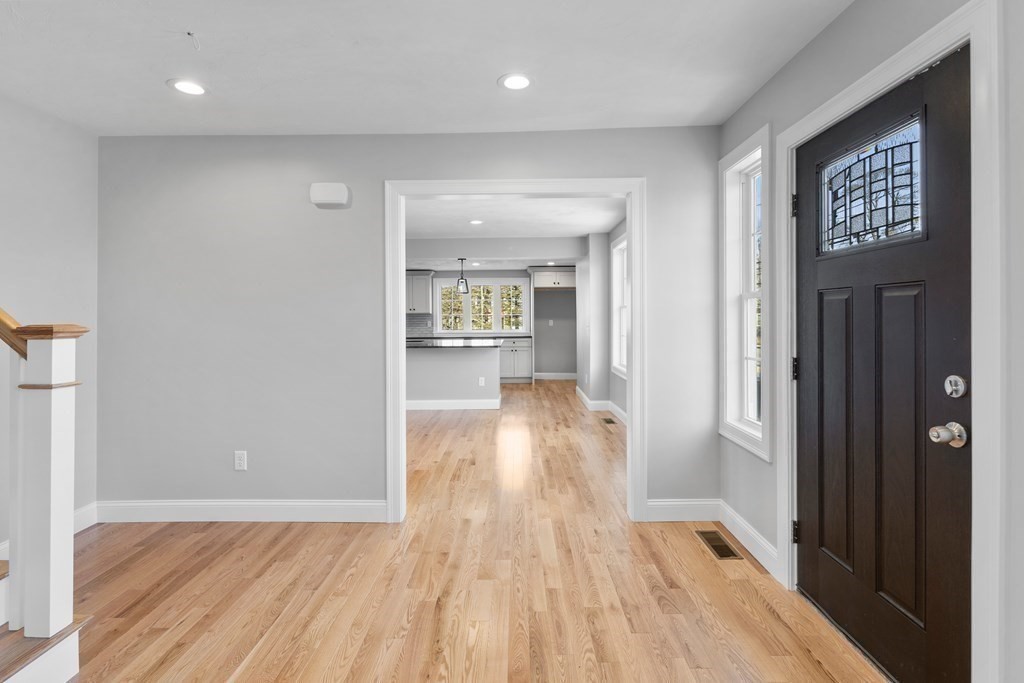 108 High Street Wareham, MA 02571 - Photo 20 of 40 wooden floor in a hall with an entryway