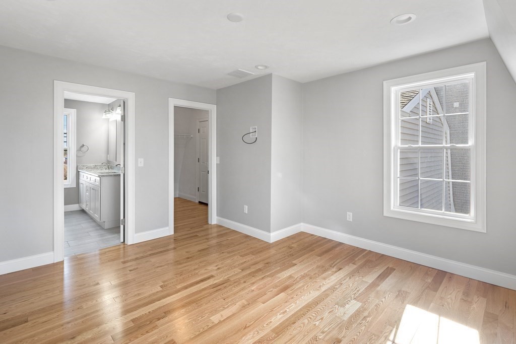 108 High Street Wareham, MA 02571 - Photo 24 of 40 wooden floor in an empty room with a window