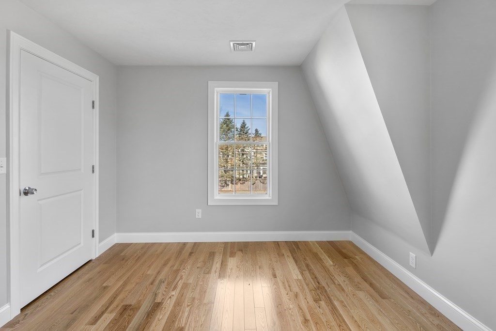 108 High Street Wareham, MA 02571 - Photo 30 of 40 wooden floor in an empty room with a window