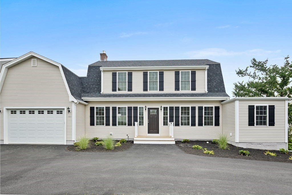 108 High Street Wareham, MA 02571 - Photo 3 of 40 a front view of a house with a garden