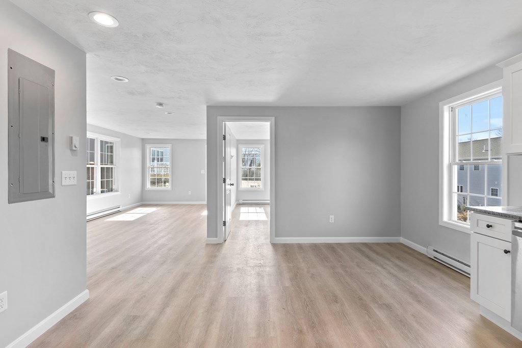 108 High Street Wareham, MA 02571 - Photo 33 of 40 wooden floor in an empty room with a window
