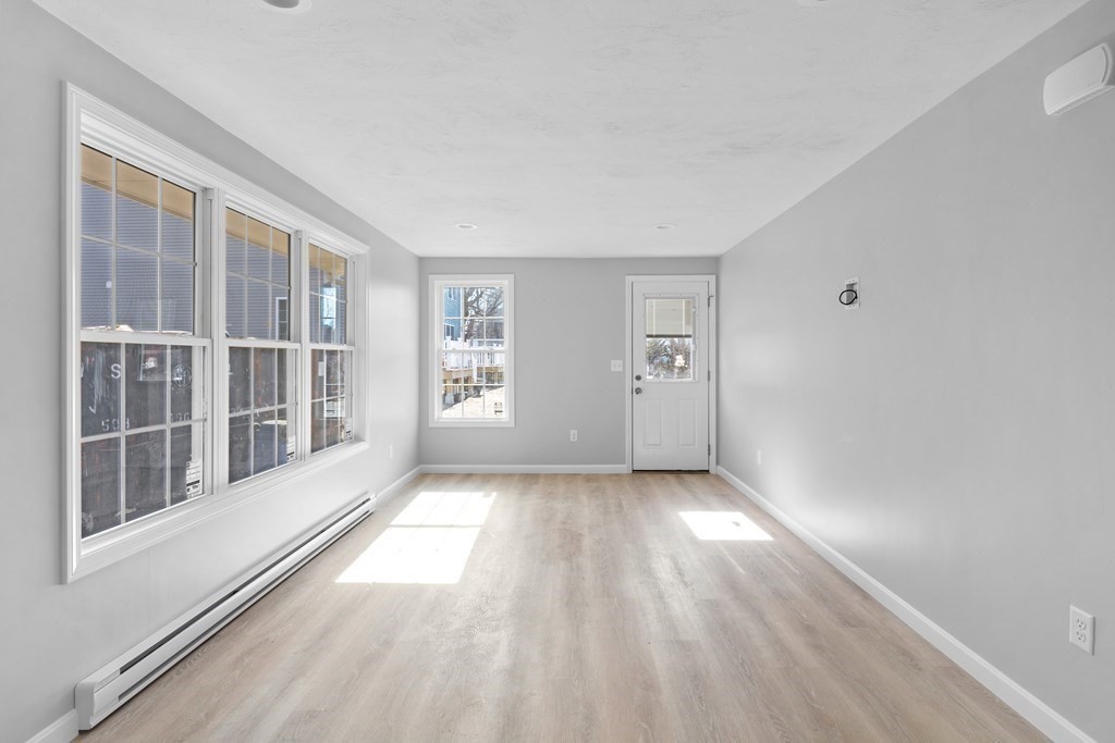 108 High Street Wareham, MA 02571 - Photo 34 of 40 wooden floor in an empty room with a window
