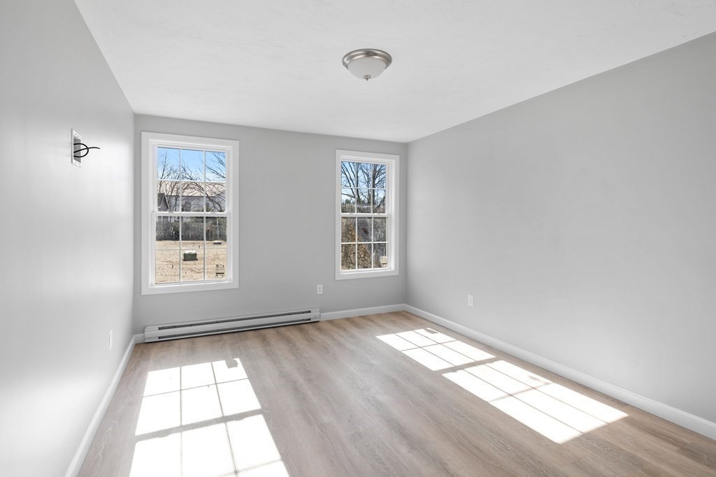 108 High Street Wareham, MA 02571 - Photo 35 of 40 a view of an empty room with a window