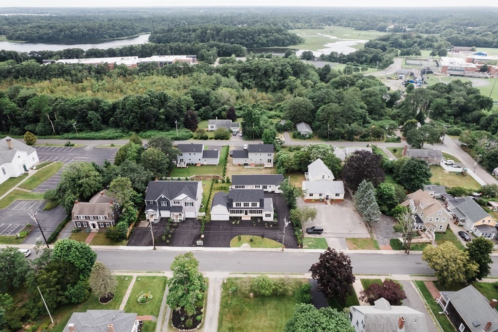 108 High Street Wareham, MA 02571 - Photo 6 of 40 an aerial view of a house with a garden