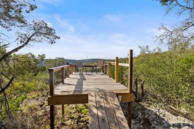 a view of a chairs and table in the terrace