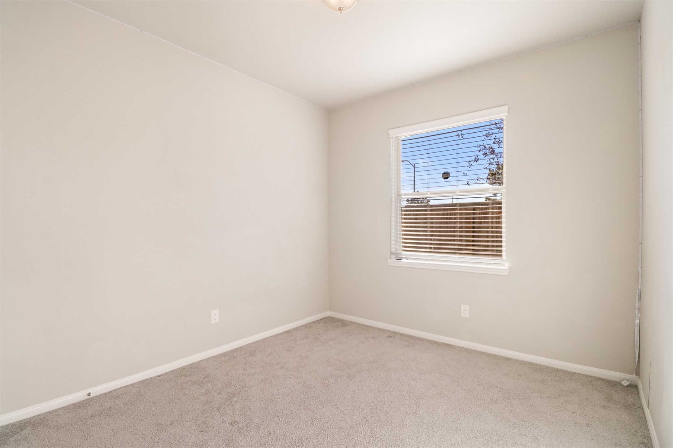 6010 Mapleton Meadow Lane Richmond, TX 77407 - Photo 12 of 34 an empty room with windows