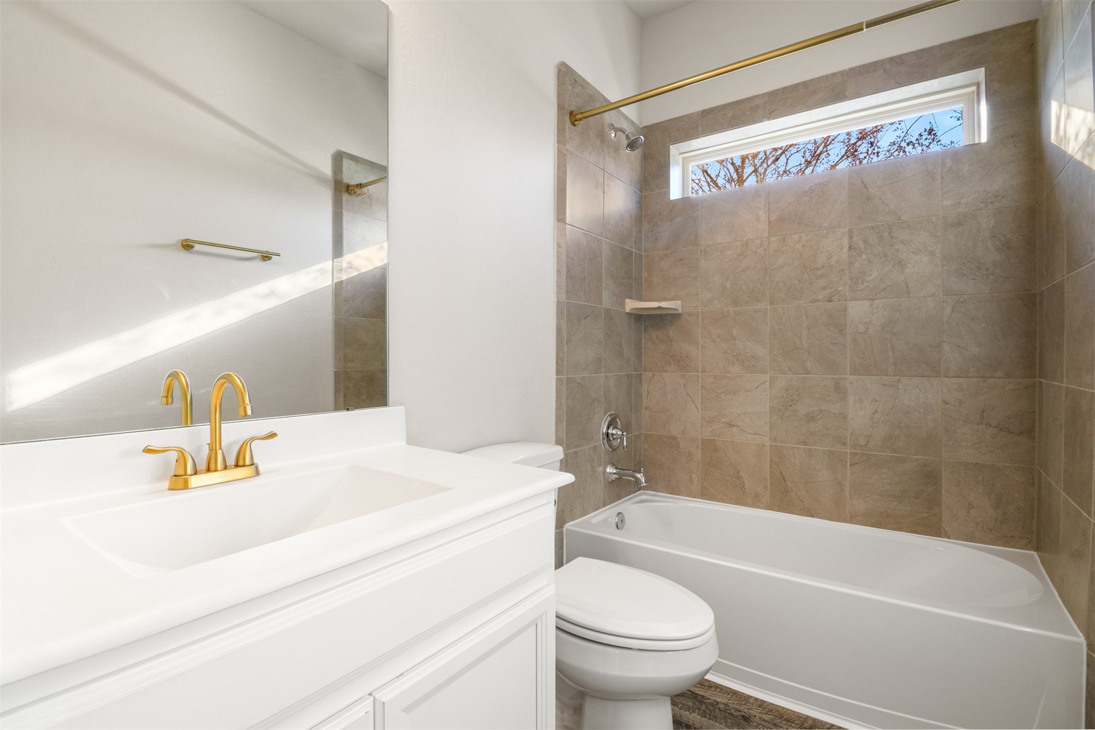 6010 Mapleton Meadow Lane Richmond, TX 77407 - Photo 15 of 34 a bathroom with a sink mirror bathtub and toilet