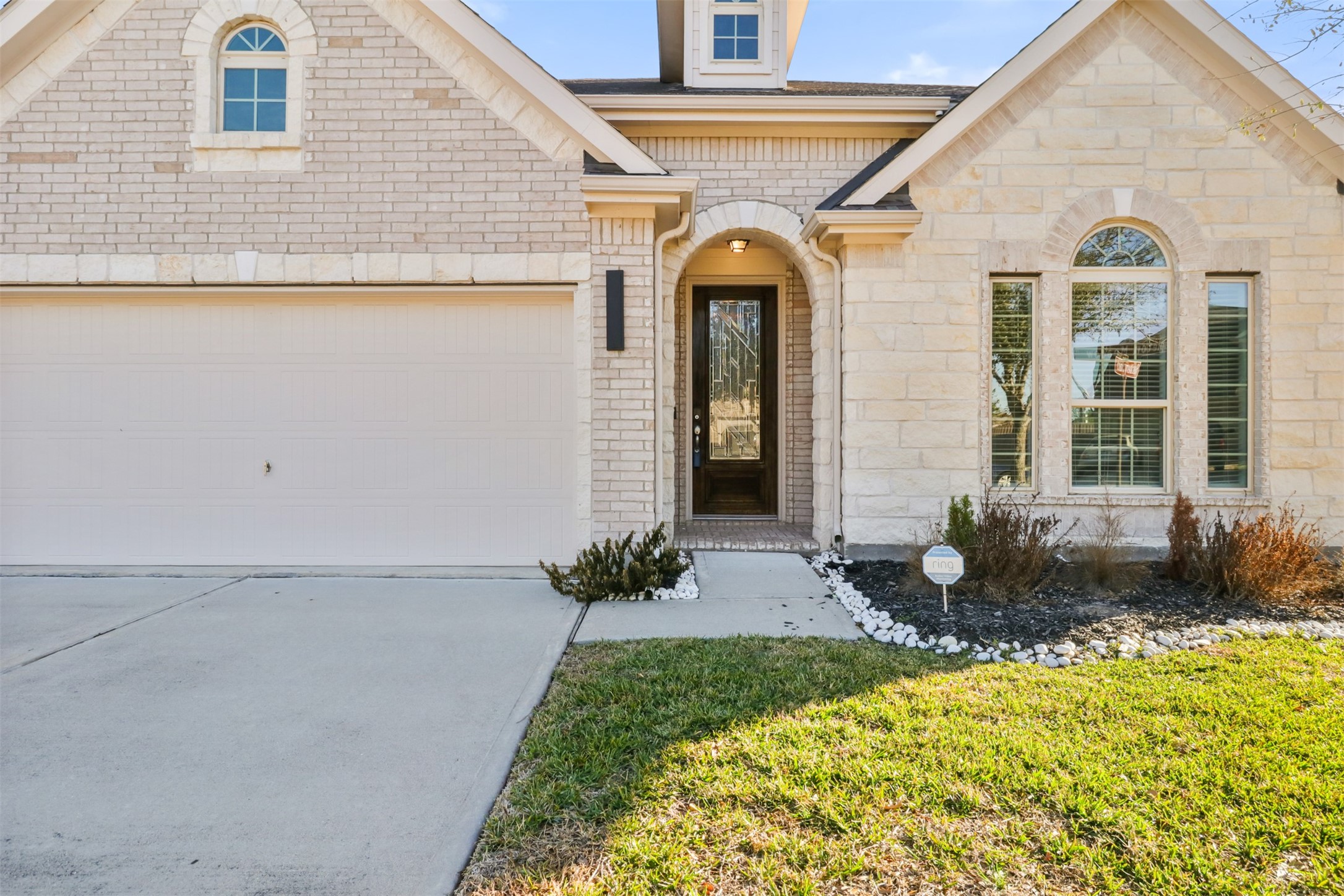 6010 Mapleton Meadow Lane Richmond, TX 77407 - Photo 3 of 34 a front view of a house with garden