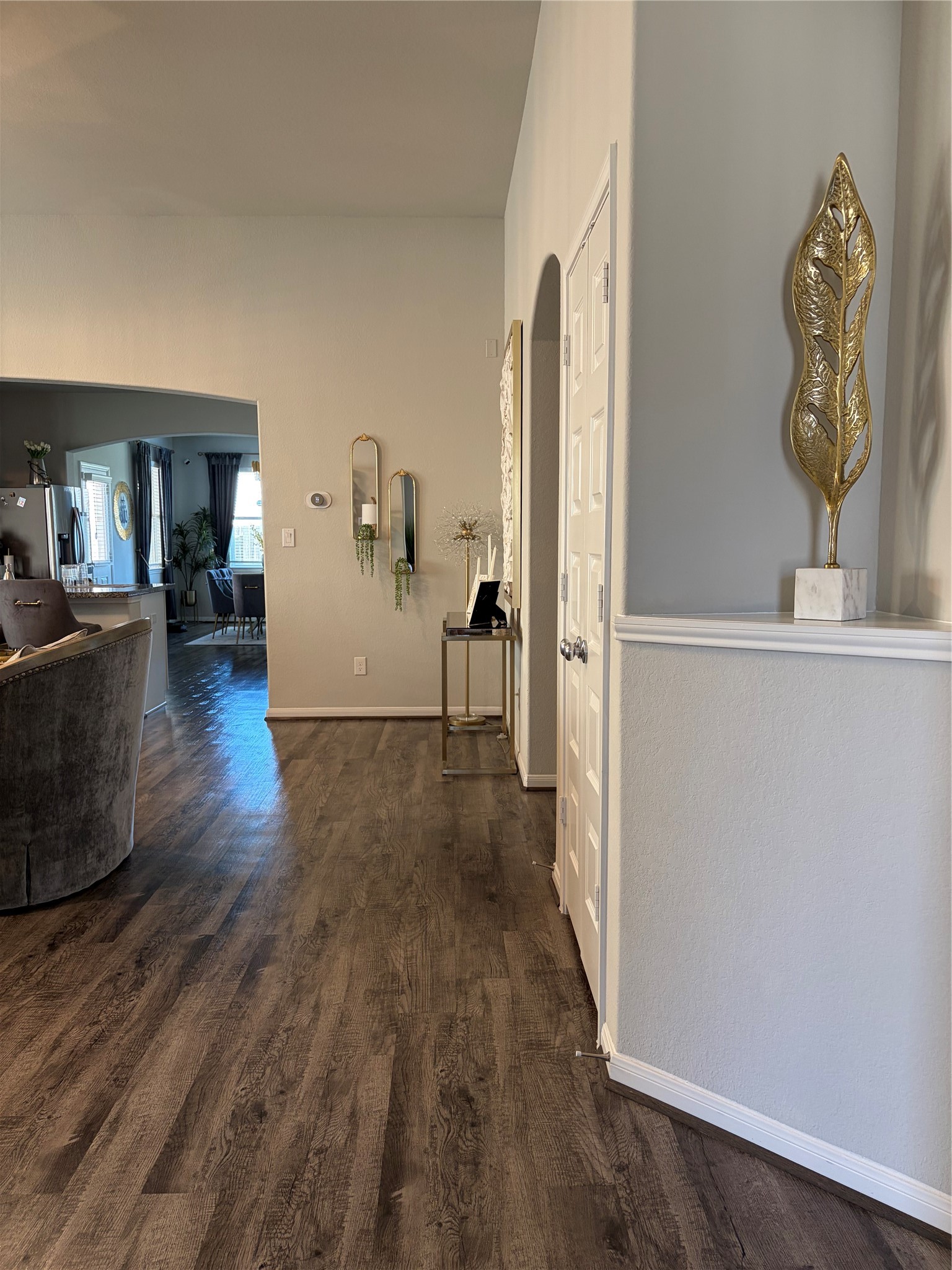 6010 Mapleton Meadow Lane Richmond, TX 77407 - Photo 34 of 34 a view of a hallway view with wooden floor and furniture