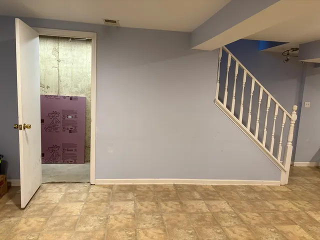 a view of walk in closet with window