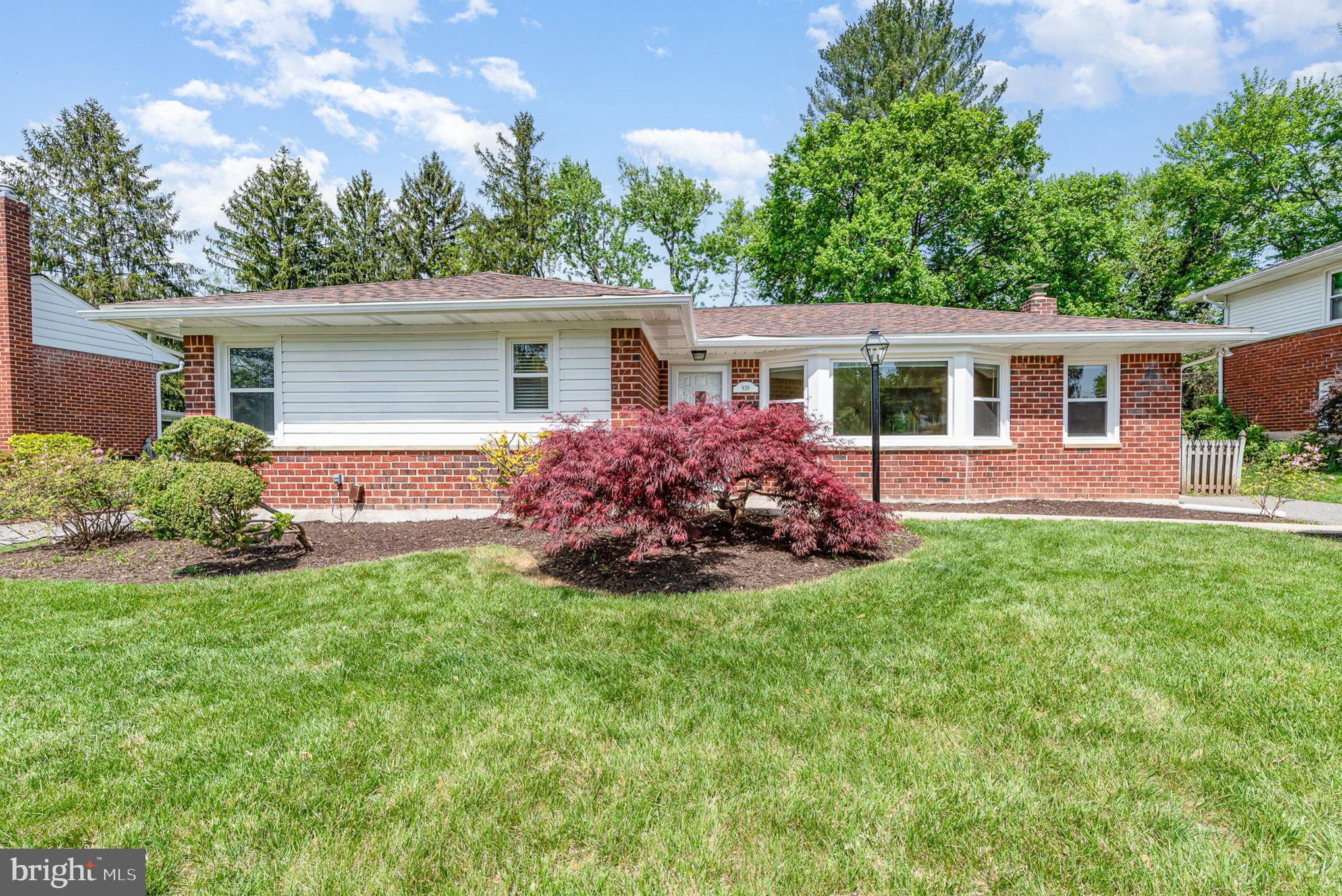 939 Starbit Road Towson, MD 21286 - Photo 36 of 52 front view of a house with a yard
