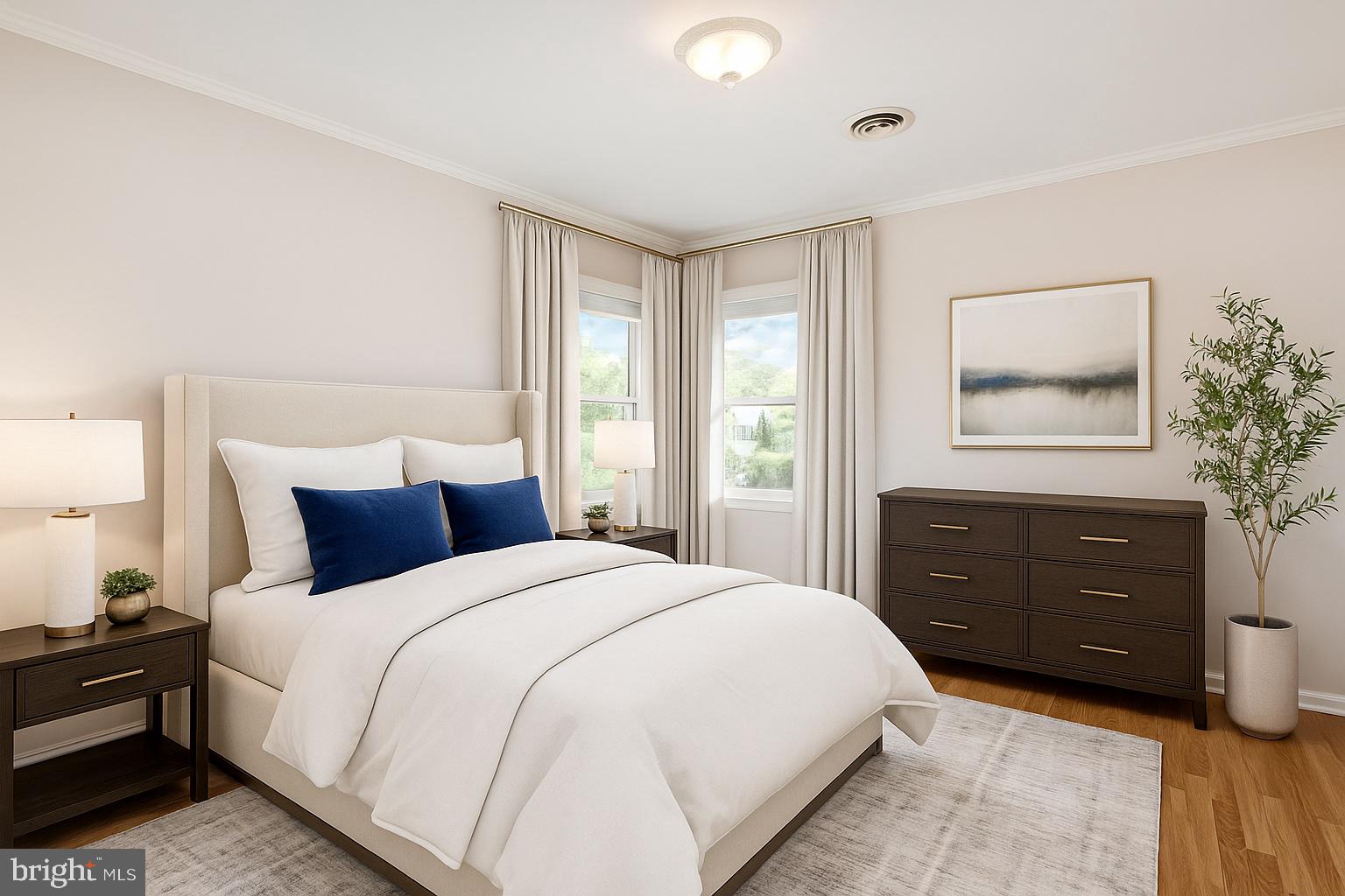 939 Starbit Road Towson, MD 21286 - Photo 5 of 52 a bedroom with a bed and a dresser