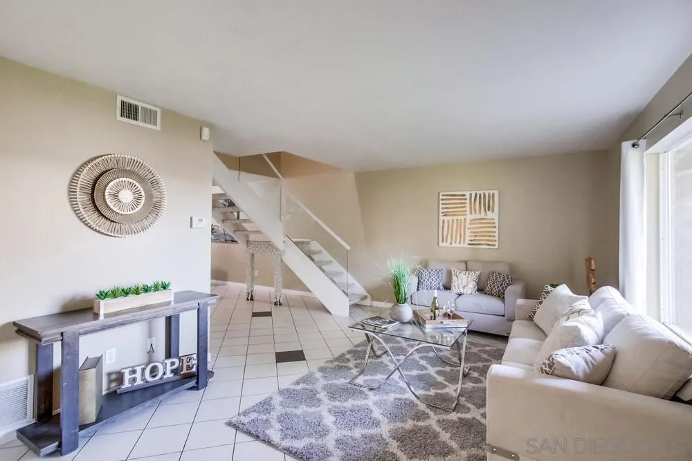 933 Greenfield Drive, Unit D El Cajon, CA 92021 - Photo 5 of 41 a living room with furniture and a window