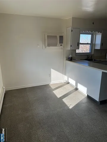 a view of a living room washer and dryer