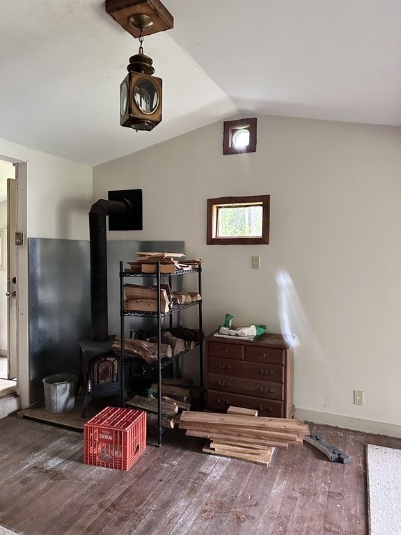 9 Washburn Terrace Spencer, MA 01562 - Photo 4 of 11 a room with gym equipment and a flat screen tv