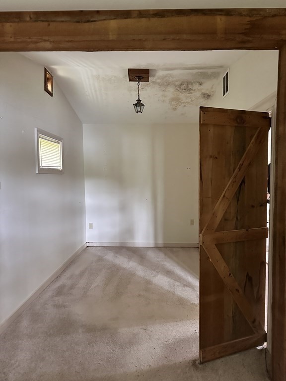 9 Washburn Terrace Spencer, MA 01562 - Photo 5 of 11 a view of a hallway with stairs