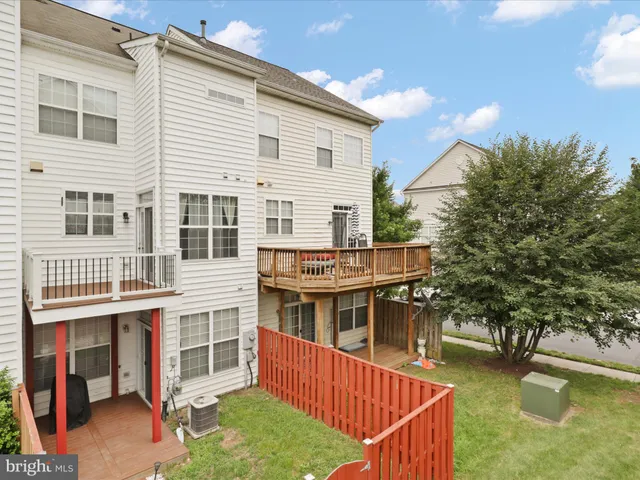 a balcony with furniture and garden