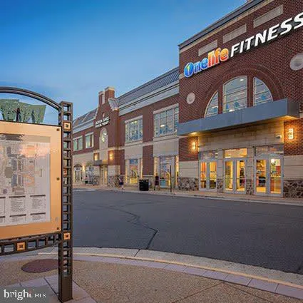 a view of a building with a street