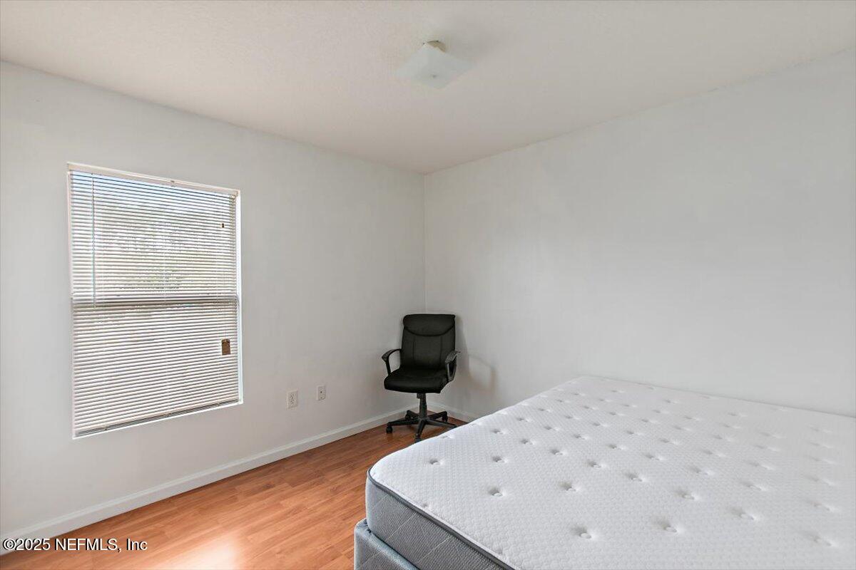 7920 Merrill Road, Unit 915 Jacksonville, FL 32277 - Photo 9 of 13 09-Bedroom