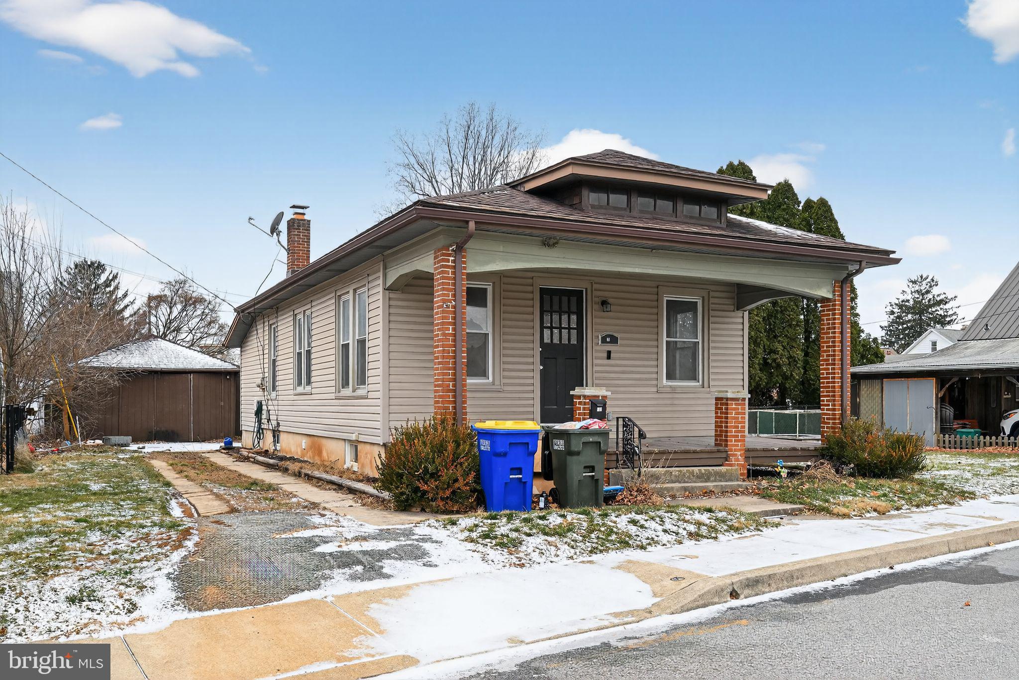 38 North Scott Street York, PA 17404 - Photo 1 of 16 a front view of a house with garden