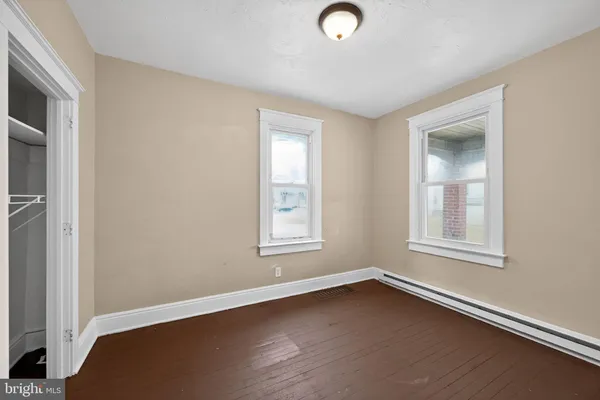 a kitchen with stainless steel appliances granite countertop a sink stove and microwave