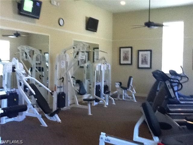 11672 Eros Road Lehigh Acres, FL 33971 - Photo 17 of 18 a view of a room with gym equipment