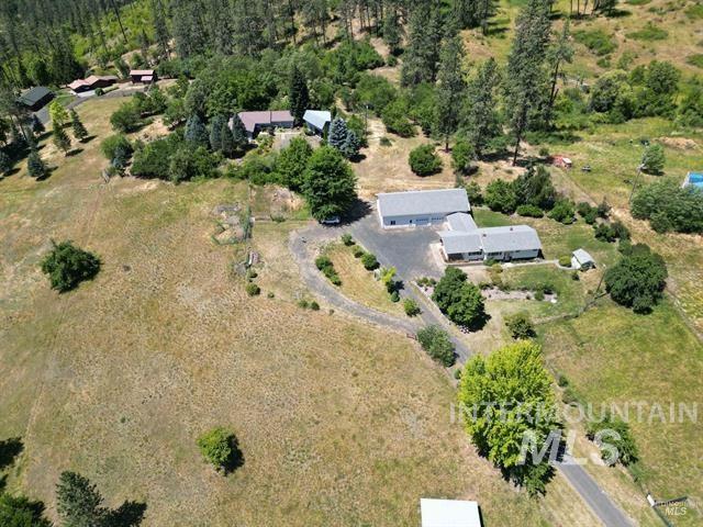 367 Woodland Road Kamiah, ID 83536 - Photo 2 of 49 Aerial overview of property's location with rural landscape