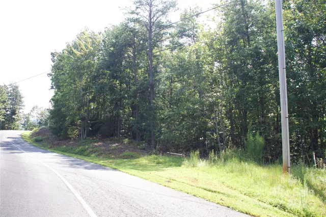 a view of swimming pool from a balcony