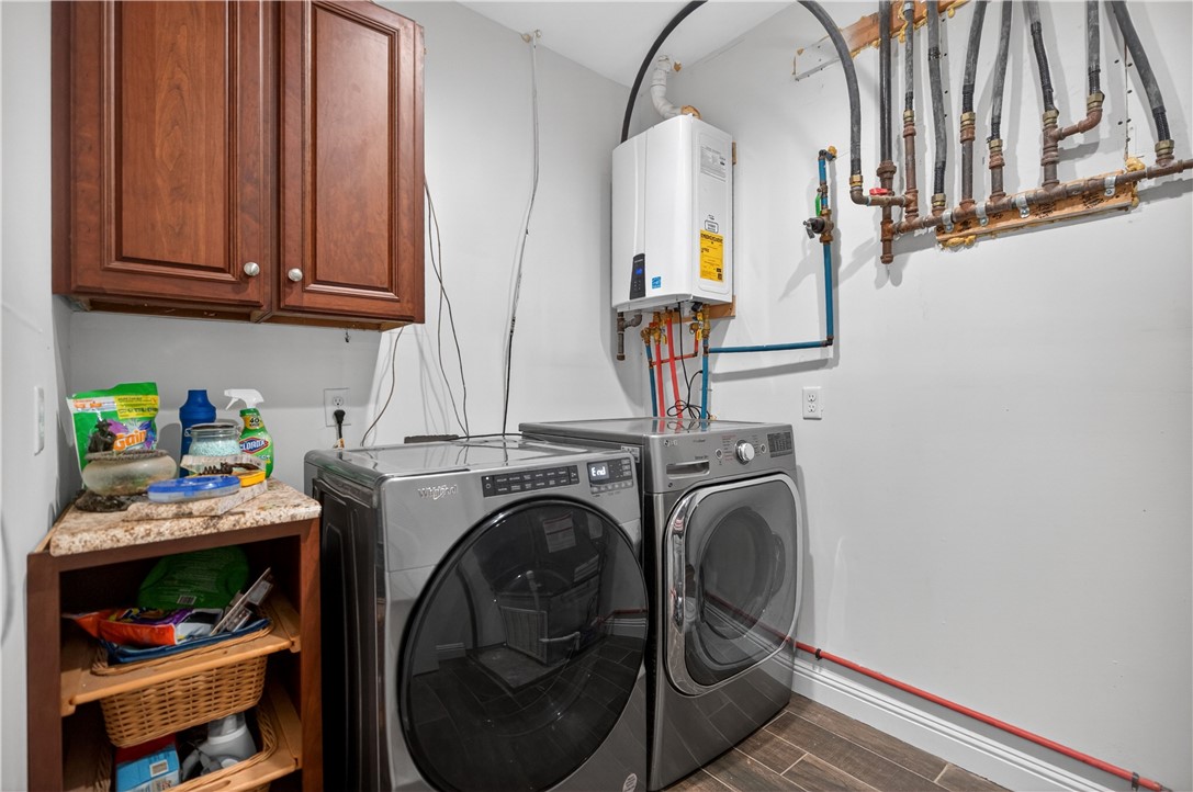 206 James Hare Road Anderson, SC 29626 - Photo 22 of 37 Functional laundry room equipped with contemporary appliances for household needs.